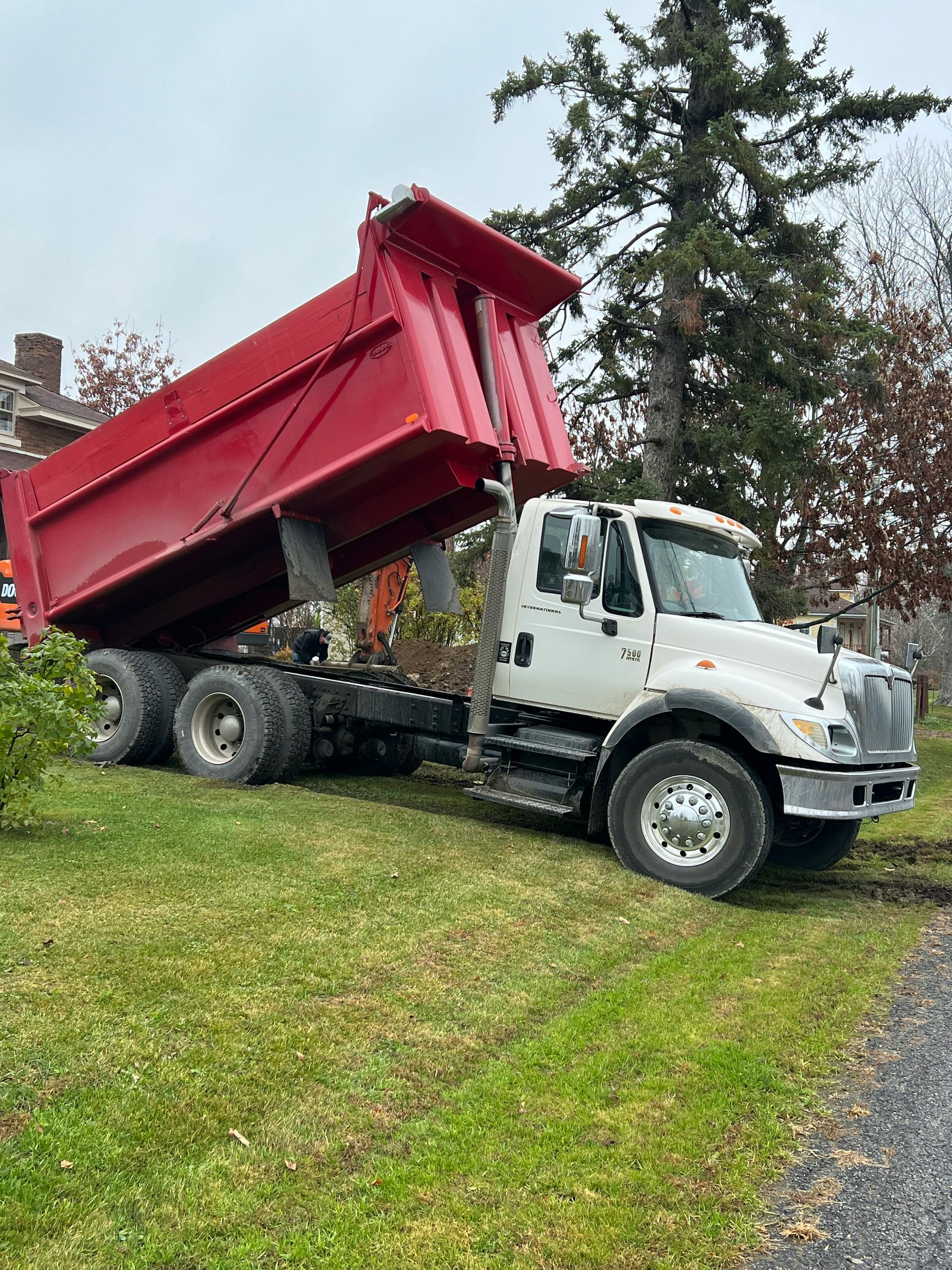 a truck with a large red trailer